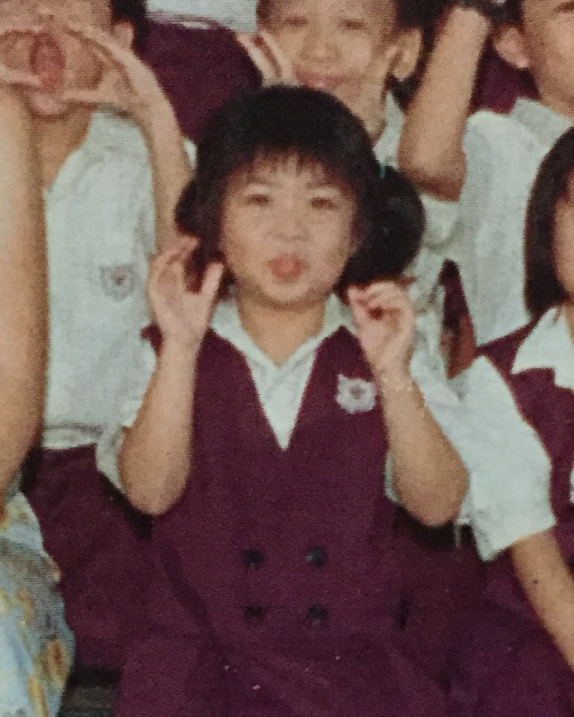 Young Carmen in school uniform